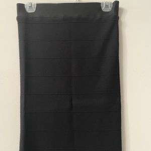 NWOT slim fit midi length skirt.